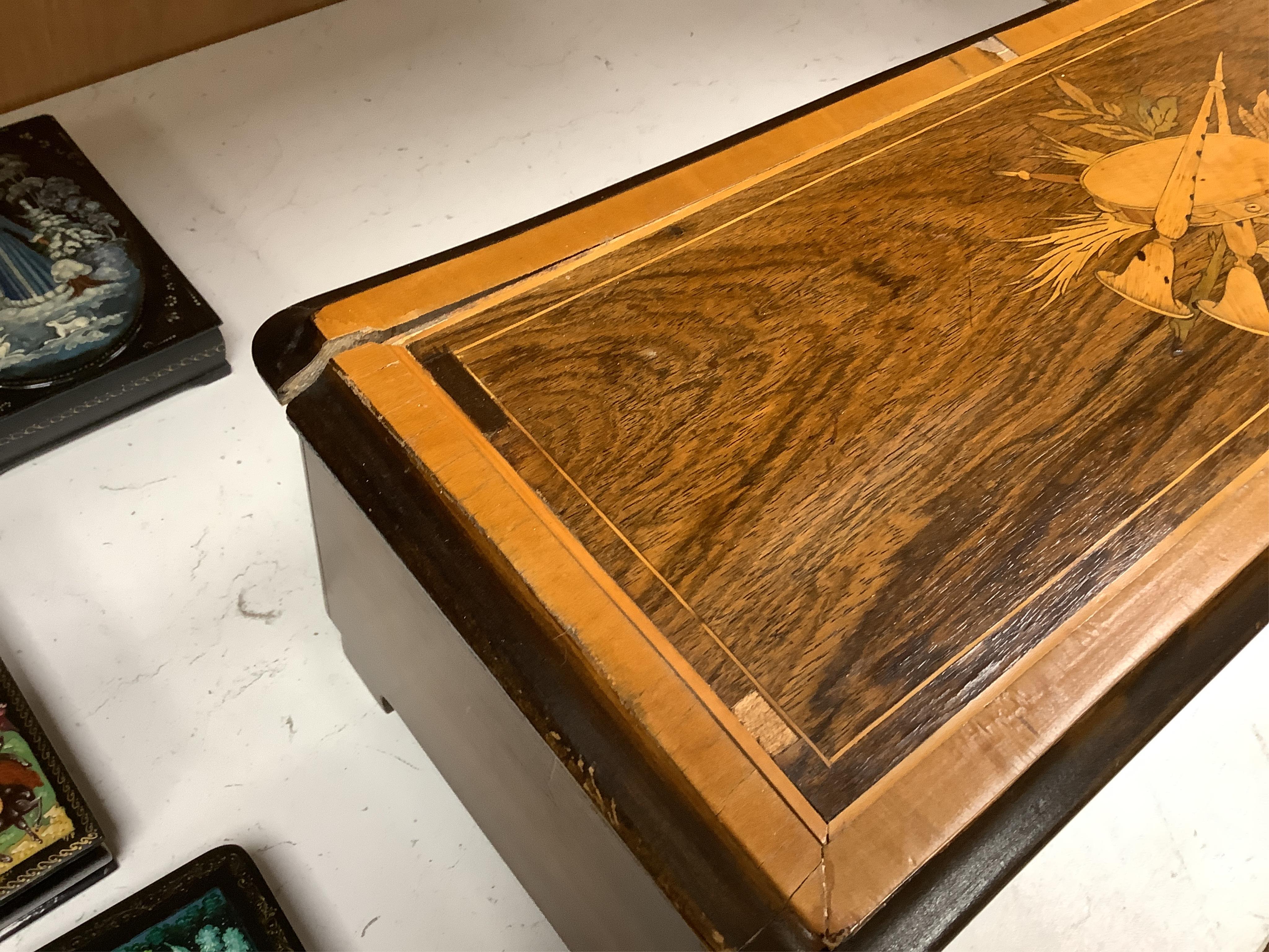A late 19th century Swiss rosewood and marquetry cased cylinder music box, playing 10 airs, 56cm wide